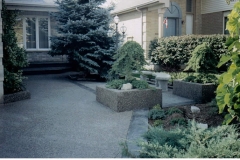 exposed aggregate flowerbed - 4 SONS CONCRETE DESIGN